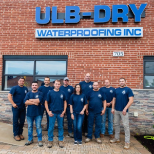 Staff of a basement waterproofing company serving Des Plaines, Illinois