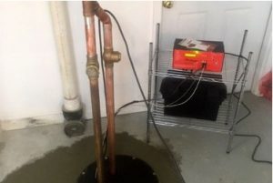 Sump pump in the basement of a house in Park Ridge, Illinois